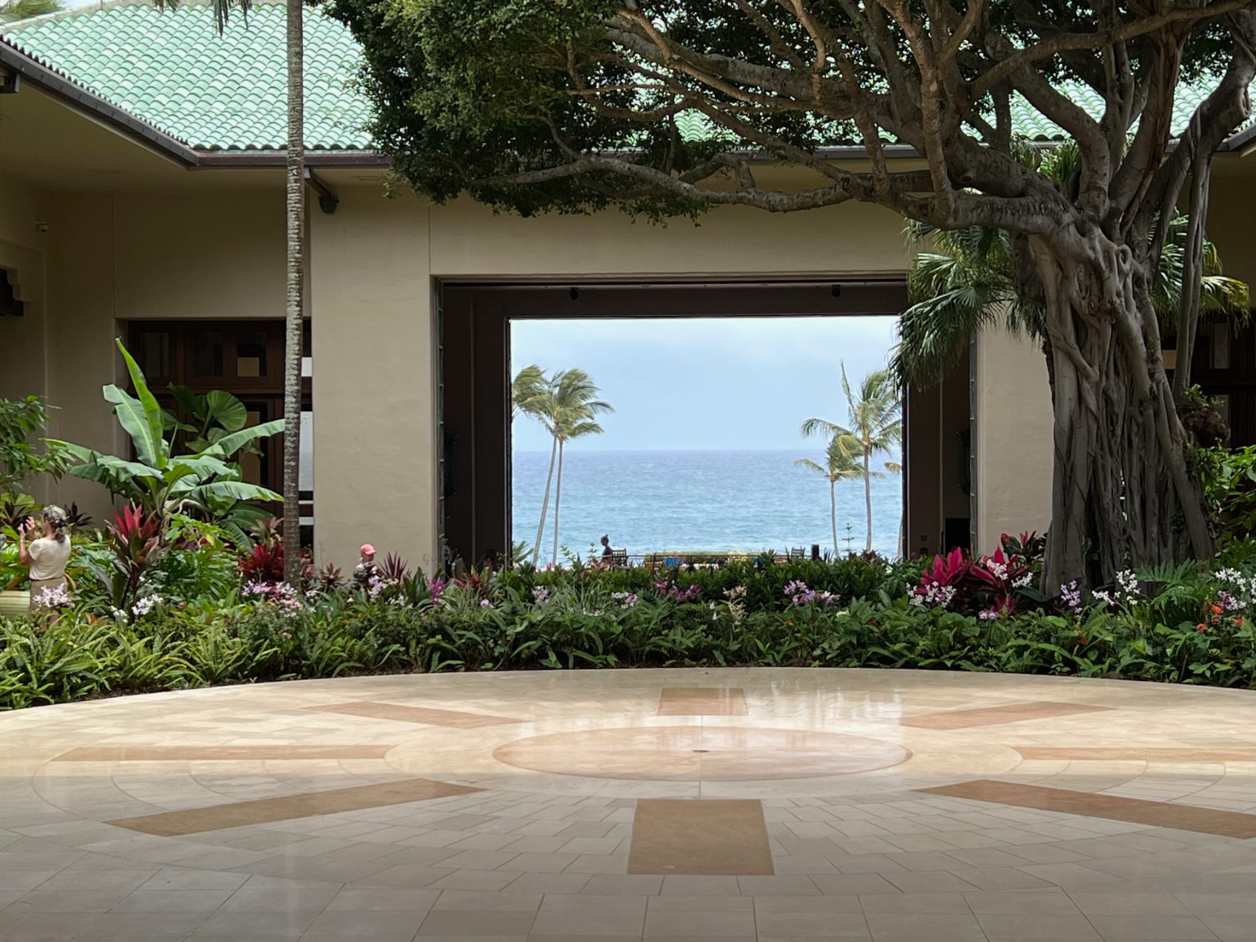 Open-air lobby framing the ocean